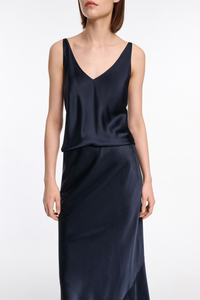 front profile model wearing Sense Of Shine v-neck cami Top Navy silk