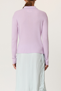 back profile model wearing Shirt Collar Merino Wool Cardigan wisteria purple ribbed knit long sleeves cardigan in lightweight merino wool. Shirt collar and covered buttons.
100% merino wool