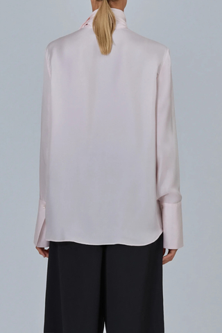 back profile model wearing Shirt With Scarf Light Pink Fluid blouse
Integrated neck scarf
Exaggerated cuffs
Clean hidden placket
Soft drape
57% silk 43% viscose