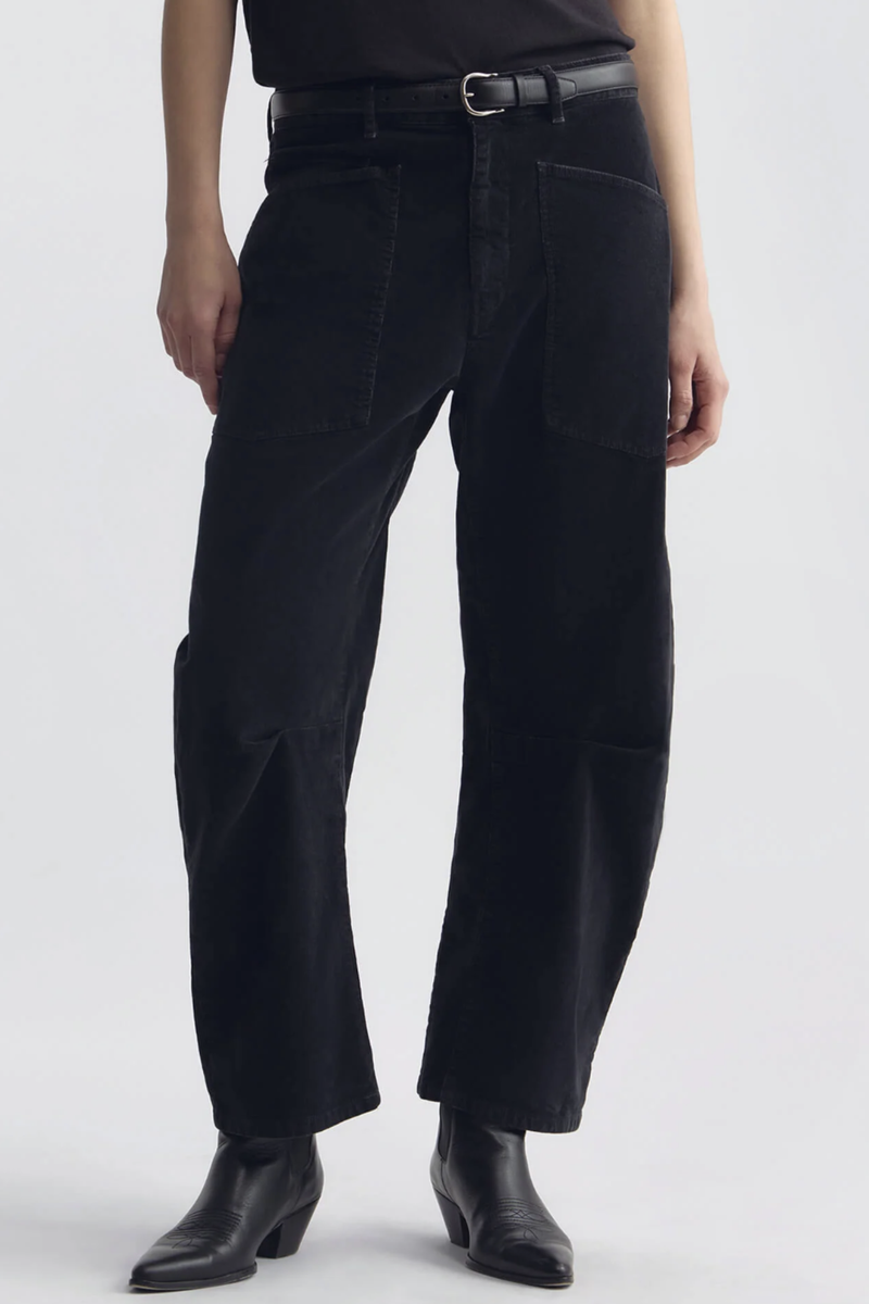 front profile model wearing Shon Corduroy Pant Charcoal Flat front
Mid-rise
Relaxed fit pant
Stretch corduroy
Curved silhouette
Easy tapered legs
Seam detail at knees
Zip fly with hidden hook and bar closure
Hidden button closure
Top-stitched front and back patch pockets
Belt loops
93% COTTON, 6% POLYESTER, 1% POLYURETHANE