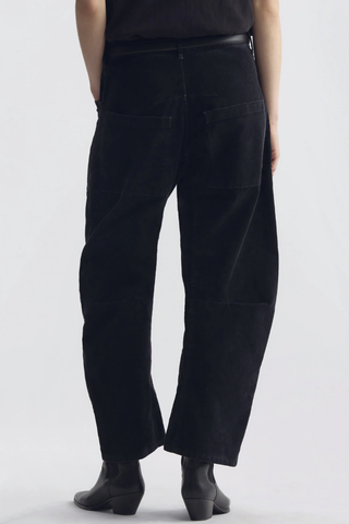 back profile model wearing Shon Corduroy Pant Charcoal Flat front
Mid-rise
Relaxed fit pant
Stretch corduroy
Curved silhouette
Easy tapered legs
Seam detail at knees
Zip fly with hidden hook and bar closure
Hidden button closure
Top-stitched front and back patch pockets
Belt loops
93% COTTON, 6% POLYESTER, 1% POLYURETHANE