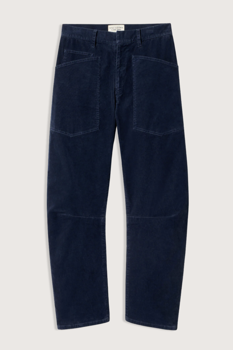 flat lay Shon Corduroy Pant Service Blue Flat front
Mid-rise
Relaxed fit pant
Stretch corduroy
Curved silhouette
Easy tapered legs
Seam detail at knees
Zip fly with hidden hook and bar closure
Hidden button closure
Top-stitched front and back patch pockets
Belt loops
93% COTTON, 6% POLYESTER, 1% POLYURETHANE