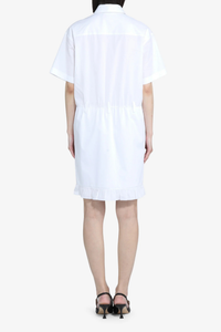 back profile model wearing Short Sleeve Poplin Dress White  cotton White shirt dress
Classic collar
Short sleeves
Button-up front
Shirtdress style
Elastic waistband
Hem is finished with a ruffle
Above-the-knee length