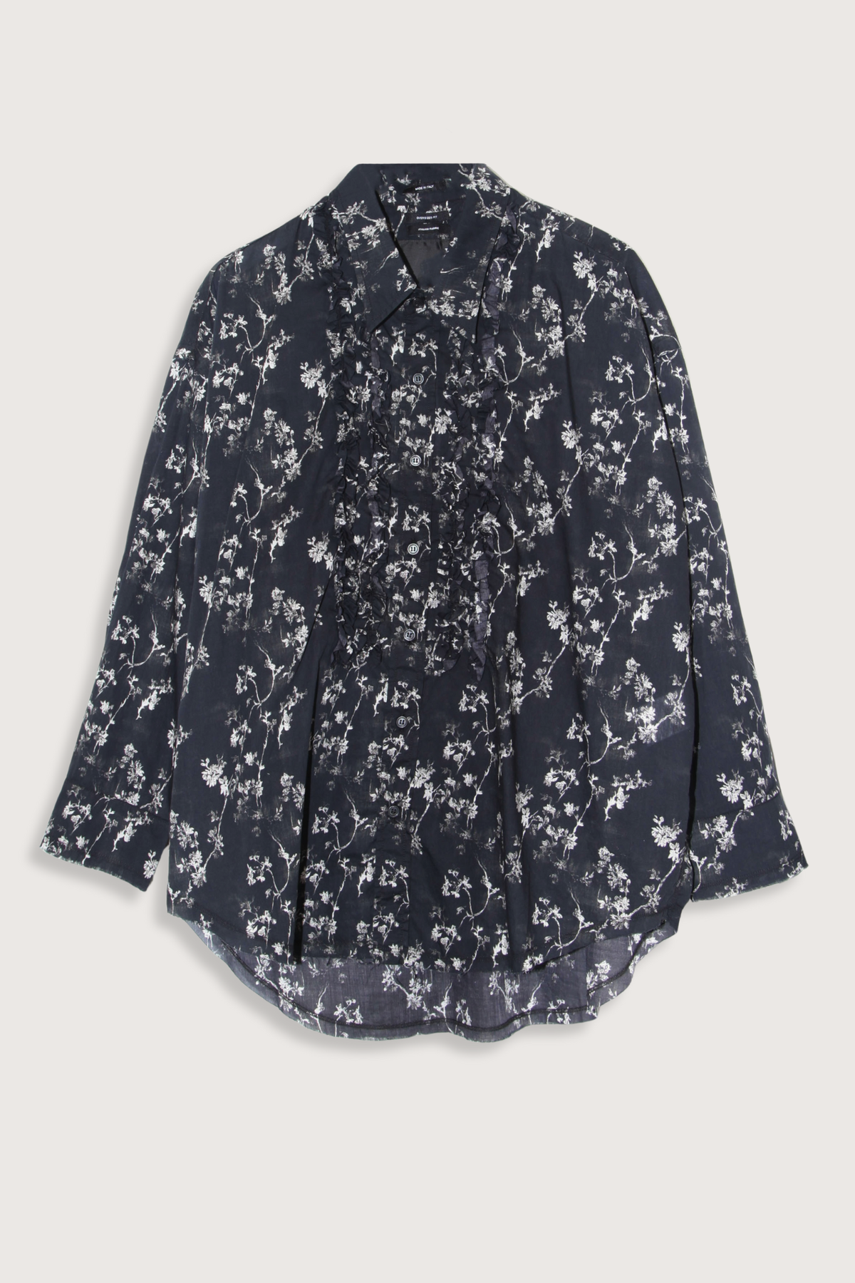flat lay Shredded Seam Ruffle black Shirt Oversized
Shredded seam shirt
Ruffled placket built from printed Italian crinkle cotton gauze