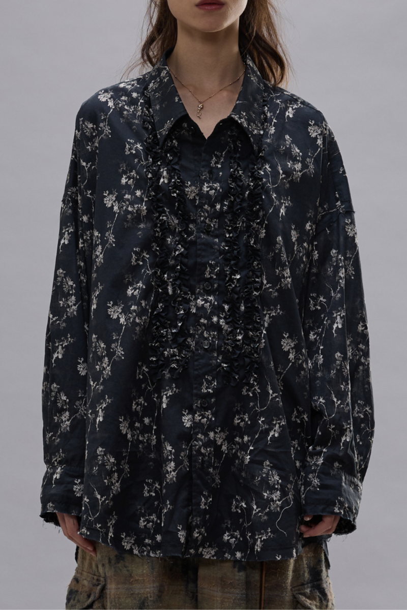 front profile model wearing Shredded Seam Ruffle black Shirt Oversized
Shredded seam shirt
Ruffled placket built from printed Italian crinkle cotton gauze