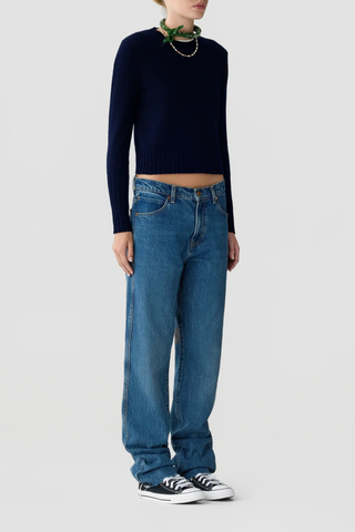 side profile model wearing  Shrunken Crew Sweater Midnight Shrunken style
Slim fit
High ribbed trims
Lightweight cashmere knit
Crew neck sweater
100% Cashmere