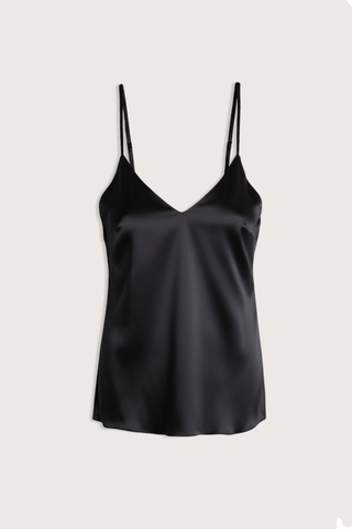 flat lay Silk Cami Top Black Classic Cami
Side bust darts
V-neckline
Thin, adjustable strap
100% Silk