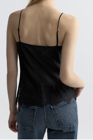 back profile model wearing Silk Charmeuse Lace Hem black Lace cami top
V-neckline
Adjustable slider straps
Delicate lace detailing
100% Silk