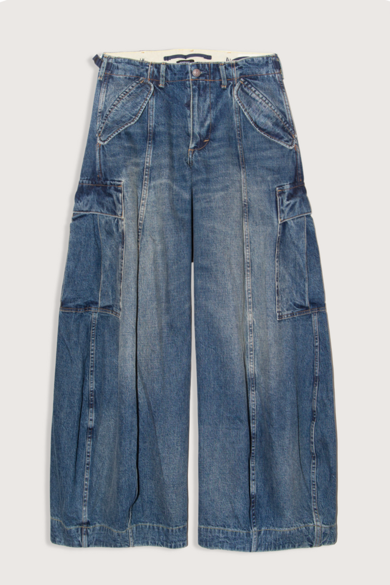 flat lay Siouxsie Field Cargo Jean dawson blue Oversized fit
Barrel leg
Utility cargo pockets
12 oz. Japanese rigid Denim
Vintage med-light wash and darker base panel on cargo pockets
100% Cotton