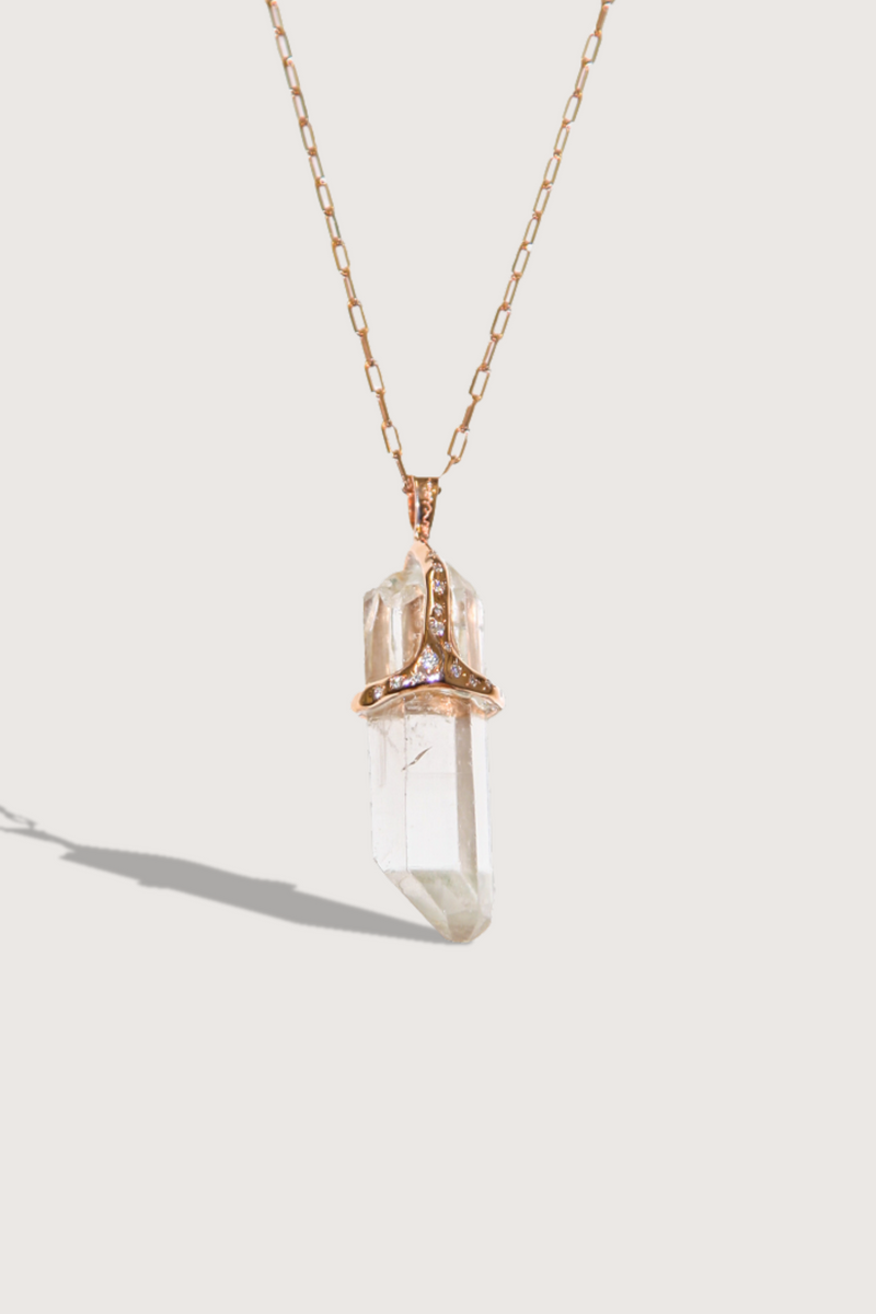 flat lay Smoky Quartz Healing Stone Necklace with 14k gold chain with diamonds