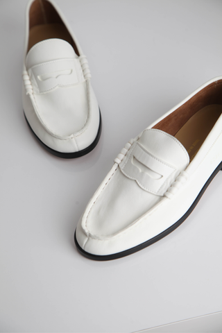 close up detail for soft leather loafer white traditional penny strap
Leather upper and lining Wide signature side number on the side