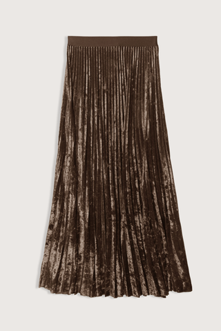 flat lay Soleil Plisse Tull Skirt Chocolate Midi length
Stretch tulle
Plissé finish
Delicate flocked detailing
Full silhouette