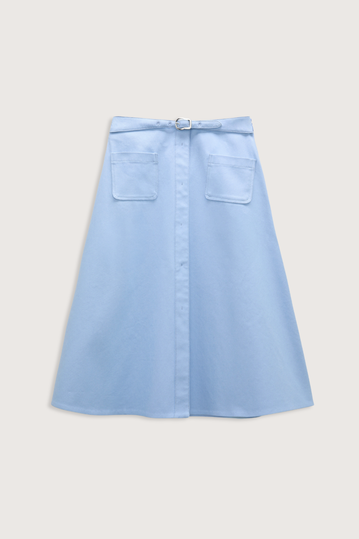 flat lay Sporty Chic Cotton Skirt mineral blue 100 % Cotton
Cotton skirt
Belted waist
Center front slit
Faux front button placket
Patch pockets
In-seam side zip closure
Unlined