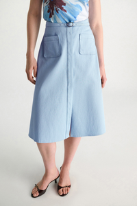 front profile model wearing Sporty Chic Cotton Skirt mineral blue 100 % Cotton
Cotton skirt
Belted waist
Center front slit
Faux front button placket
Patch pockets
In-seam side zip closure
Unlined