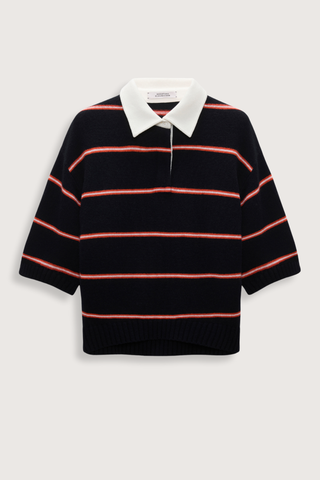 flat lay Sporty Statement Sweater Energetic Blue Trio The Merino-cashmere knit top has a contrast polo collar and placket in cotton. The boxy style is cropped and has wide, elbow-length sleeves.
70 % Virgin wool (Merino), 30 % Cashmere
Two-tone fine stripe Merino-cashmere knit top with polo collar
Cotton collar and button placket with topstitching
Hidden button closures