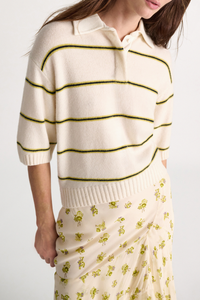 front profile model wearing Sporty Statement Sweater White Ginger Trio 70 % Virgin wool (Merino), 30 % Cashmere
Two-tone fine stripe Merino-cashmere knit top with polo collar
Cotton collar and button placket with topstitching
Hidden button closures