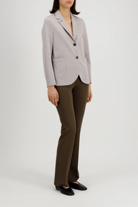 side profile model wearing Stand Collar Blazer Tobacco/White Boyfriend blazer
Unlined in knitted coolmax seersucker
Stand-up collar blazer
Boxy shape
Fitted long sleeve
Patch pockets
2-button fastening
1 collar button for full closure
Raw-edge finish
Made in Italy with Japanese fabric
Seersucker Blazer
65% Cotton, 35% Polyester