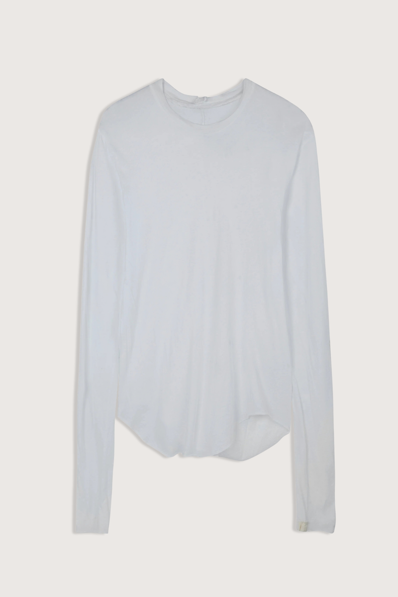 flat lay Stella Long Sleeve Cotton Top White Signature tissue-weight cotton
Semi-sheer
Softening beautifully with every wear
Extra-long sleeves and a raw, curved hem
100% Cotton
Relaxed silhouette with natural drape