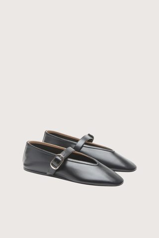 angled profile Stella Slipper With Buckle  -Lambskin Leather black Handcrafted
Lambskin leather
Silver buckle-fastening
Cushioned calf leather insole
Leather piping
8mm heel