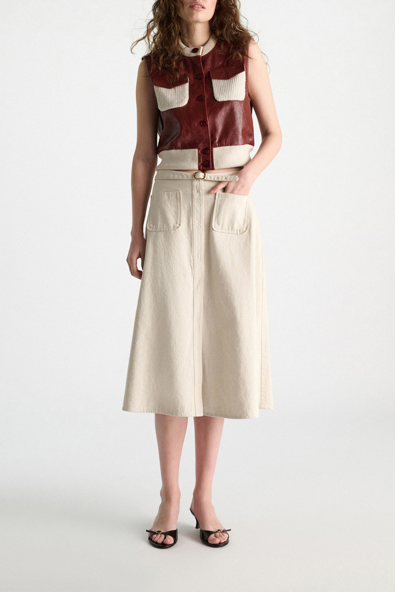 front profile model wearing Summer Of Love Skirt champagne white Flared skirt
Matching belt, with a signature buckle closure
85 % Cotton, 15 % Linen
Belted waist
Center front slit
Faux front button placket
Patch pockets
In-seam side zip closure
Unlined