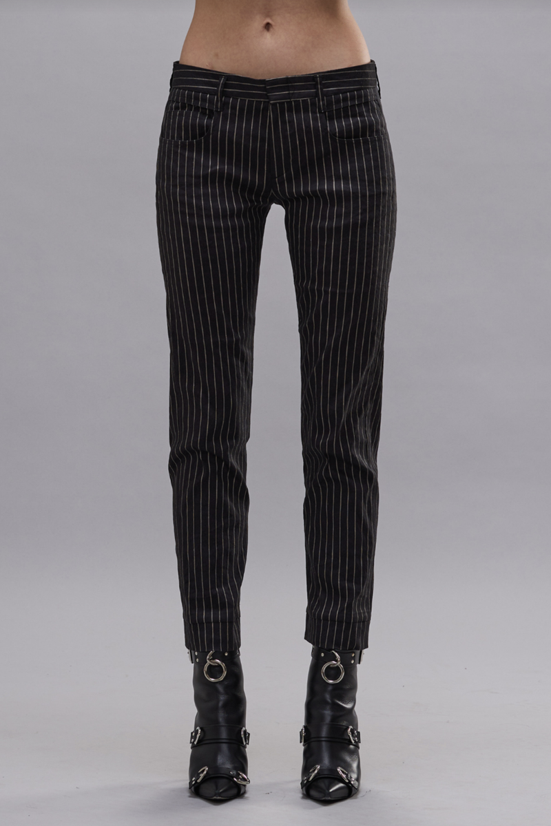 front profile model wearing Tailored Boy Straight Tailored Boy Straight pant made
Black and White Pinstripe pattern
Italian linen stretch fabric
