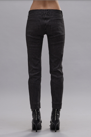 back profile model wearing Tailored Boy Straight Tailored Boy Straight pant made
Black and White Pinstripe pattern
Italian linen stretch fabric