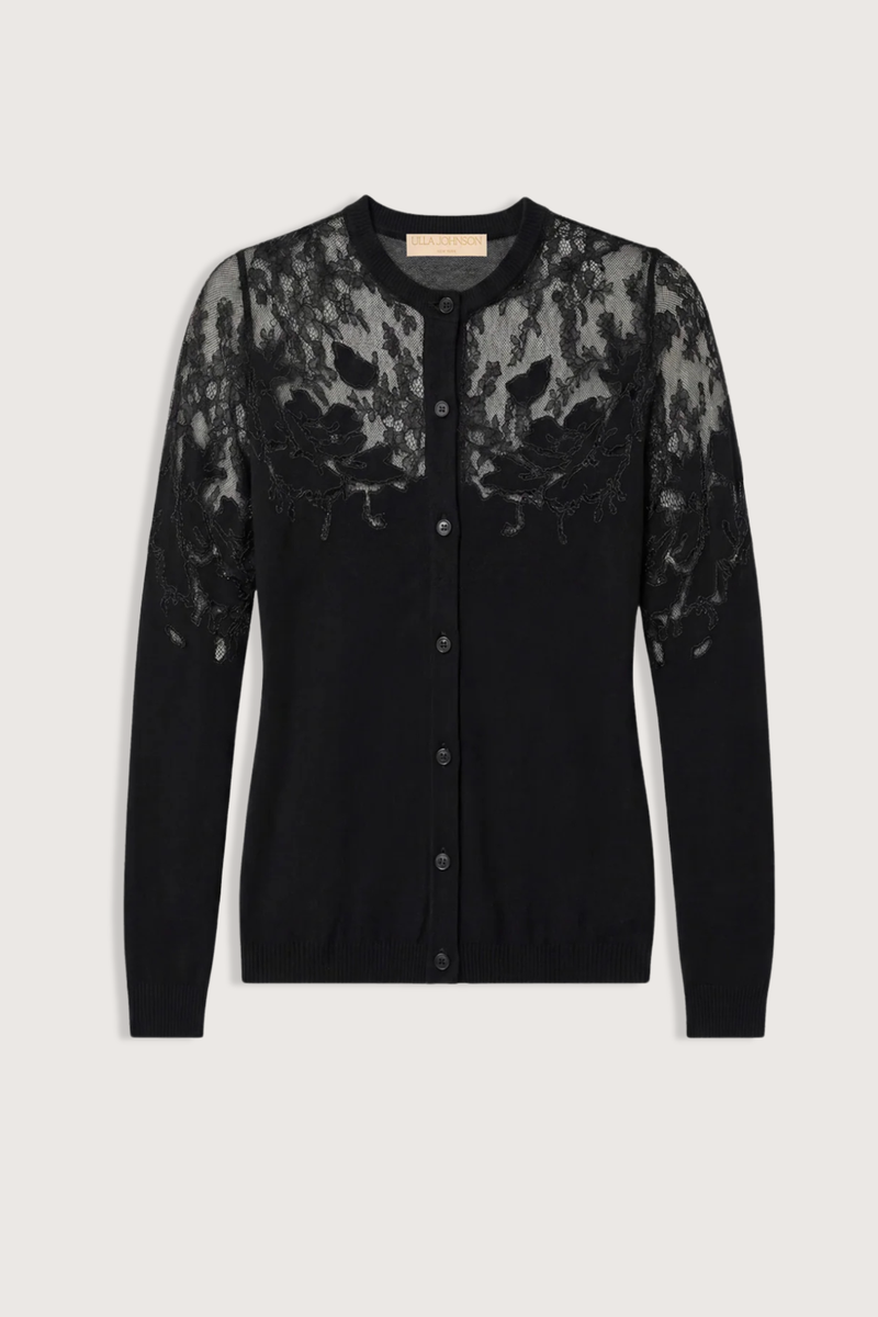 flat lay Talia Lace Cardigan Noir black Embroidered floral detail
Hand-inlaid over a Chantilly lace base
100% merino wool
Buttons closures
Long sleeves
Fitted throughout
Yoke embroidery