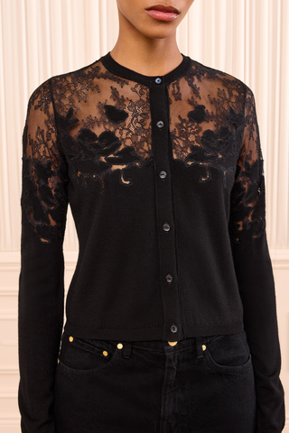 front profile model wearing Talia Lace Cardigan Noir black Embroidered floral detail
Hand-inlaid over a Chantilly lace base
100% merino wool
Buttons closures
Long sleeves
Fitted throughout
Yoke embroidery