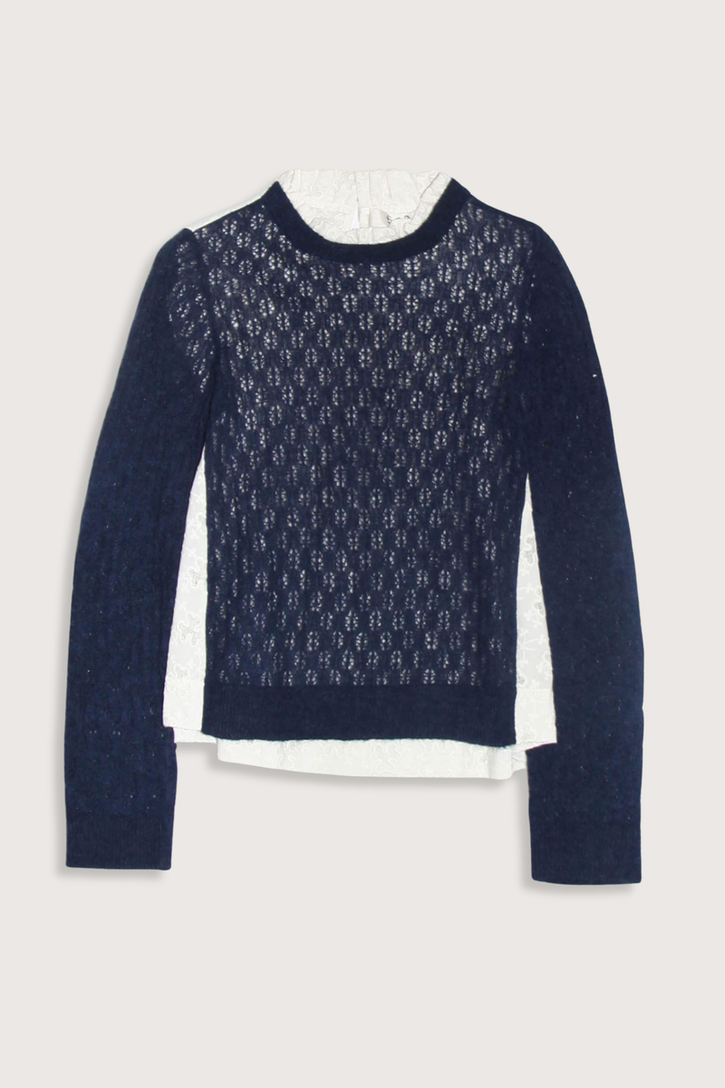 flat lay Teagan Knit Sweater Navy Soft alpaca wool at the front
Intricate embroidery on the back
Delicate ruffle at the collar
Ribbed-knit trim at the cuffs and hem
Self-55% alpaca, 45% polyamide
combo-100% cotton
Button back closure