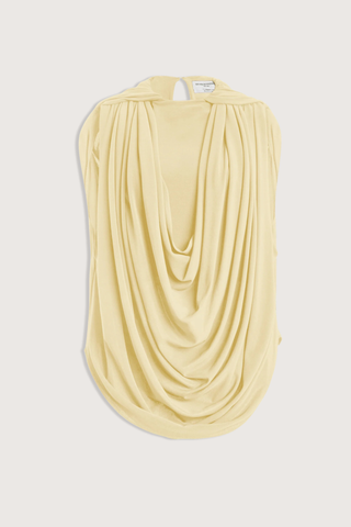 flat lay The Astor Draped Jersey Top Butter Cascading folds
Sleeveless
Deep cowl-neck draping
Fitted silhouette through the waist
100% Viscose Jersey
