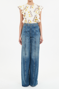 front profile model wearing The Bianca Wide Legs Jeans blue wash with center front raised seam