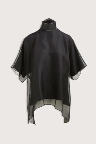 flat lay The Cali Organza Blouse With Neck Tie Oversized blouse
Sculptural volume
Integrated scarf neckline
Coordinating satin camisole
Refined interplay of sheer and opaque for a modern, elegant finish
100% lightweight silk organza