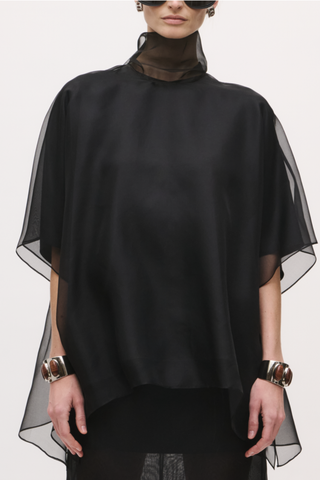 front profile model wearing The Cali Organza Blouse With Neck Tie black ORGANZA BLOUSE
NECK TIE
SATIN LINER
100% SILK
HIGH NECK
