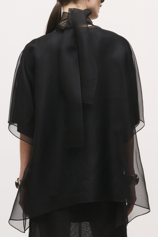 back profile model wearing The Cali Organza Blouse With Neck Tie black ORGANZA BLOUSE
NECK TIE
SATIN LINER
100% SILK
HIGH NECK
