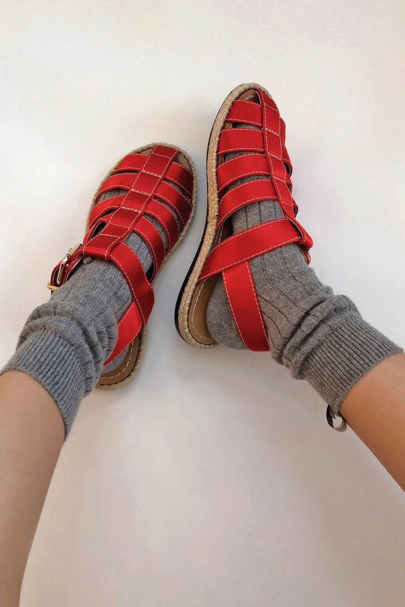 model wearing  The Cashmere Sock Heather Grey cashmere ribbed with logo ribbon tab