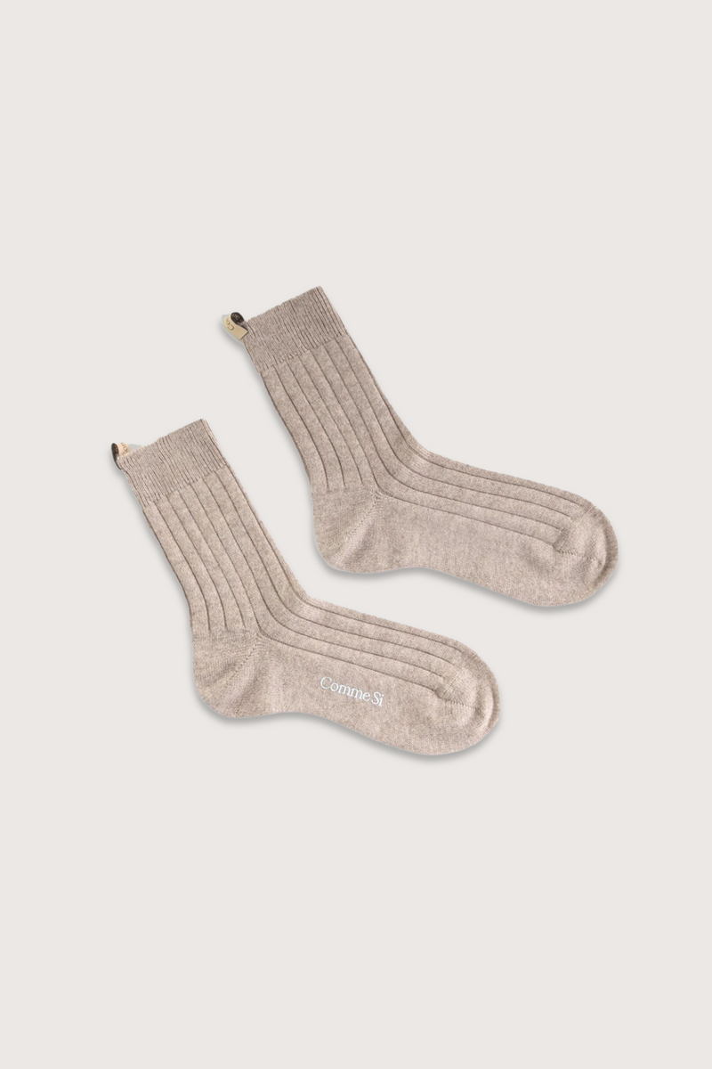 flat lay The Cashmere Sock Oatmeal cashmere ribbed with logo ribbon tab