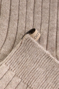 close up logo ribbon detail for The Cashmere Sock Oatmeal cashmere ribbed