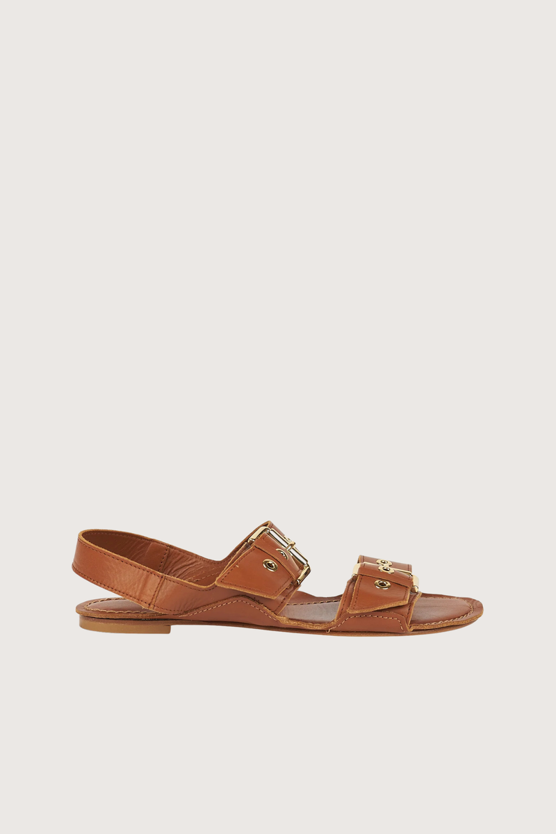 side profile The Double Buckle Sandal Cognac Double Buckle sandal
Handmade
Soft Italian calfskin
Opanka construction
Leather wrapped insole and leather sole