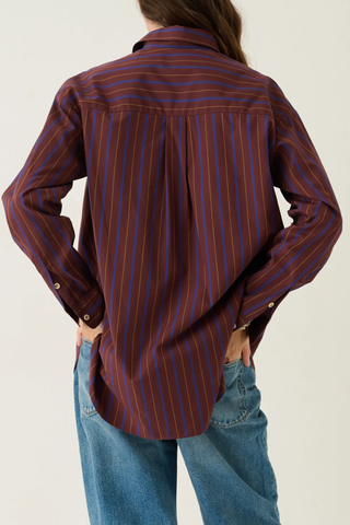 back profile model wearing  The Essential Striped Shirt Oxblood Relaxed fit
Beautiful drape
Perfectly placed button at the chest
Button just under the collar
Small button perfectly placed on the cuff placket
93% Cotton 7% Silk