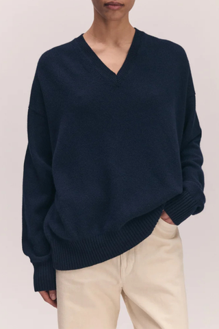 front profile model wearing The Innes Slouch V-Neck Sweater navy Classic V-neck
Softest, geelong lambswool
Gently slouchy, long sleeve