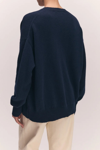 back profile model wearing The Innes Slouch V-Neck Sweater navy Classic V-neck
Softest, geelong lambswool
Gently slouchy, long sleeve
