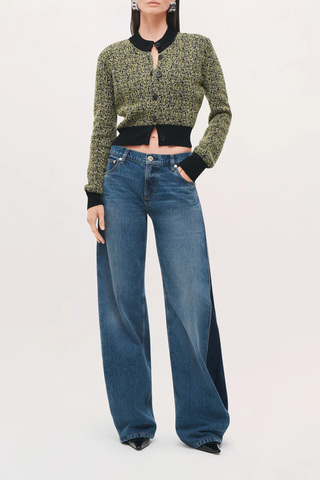 front profile model wearing The Lana Trouser Denim bi-color blue mid wash
Wide-leg
Split seam construction
Integrated side pleats 
Classic five-pocket construction
Back darts in place of a traditional denim yoke
Brown denim back patch
Zip fly with button closure
100% Cotton