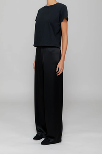 side profile model wearing The Margo Black cotton crewneck tee