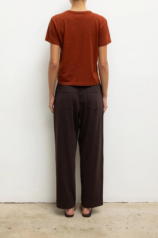 back profile model wearing The Margo Cinnamon cotton classic fit crewneck tee