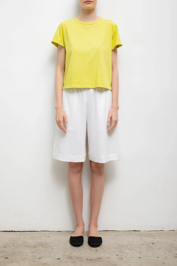 front profile model wearing The Margo Tee Chartreuse Classic, relaxed fit
Crewneck
short sleeve
100% Cotton