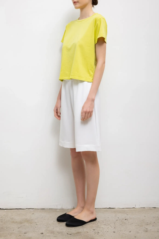 side profile model wearing The Margo Tee Chartreuse Classic, relaxed fit
Crewneck
short sleeve
100% Cotton