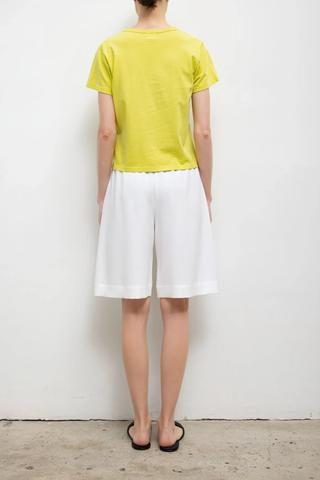 back profile model wearing The Margo Tee Chartreuse Classic, relaxed fit
Crewneck
short sleeve
100% Cotton