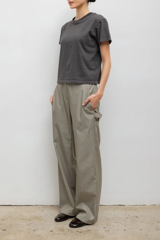 side profile model wearing The Margo Tee Slate grey Classic, relaxed fit
Crewneck
short sleeve
100% Cotton