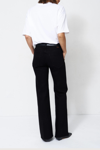 back profile model wearing The Mid Rise Crease Jean - Stretch Mid rise
Flare leg
32” inseam
Italian stretch
Overdyed black
99% Regenerative Cotton 1% Elastane