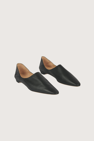 angled profile The Mule black leather slim almond pointed toe with step down soft heel 